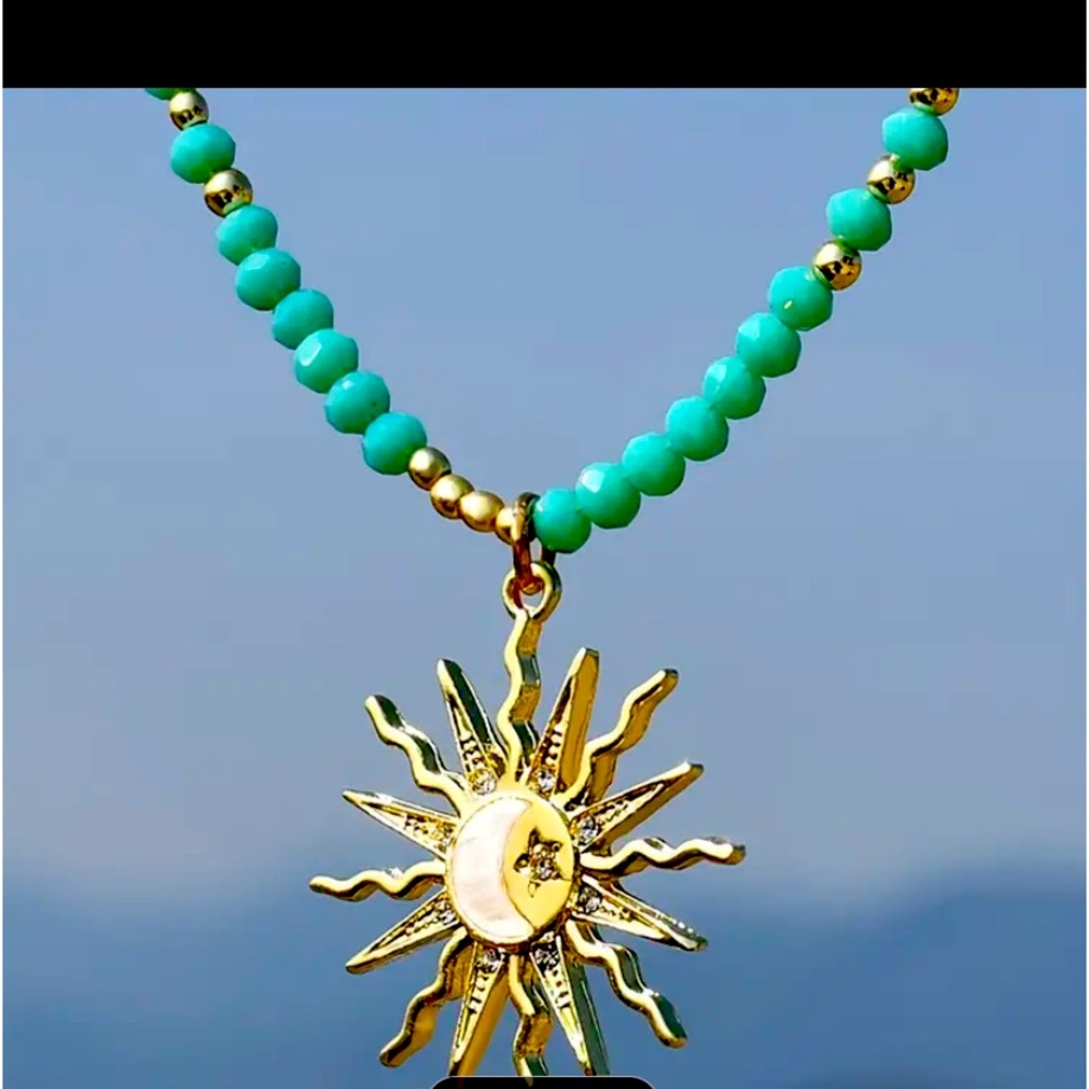 14 K gold plated vintage looking sun and moon necklace. Absolutely gorgeous